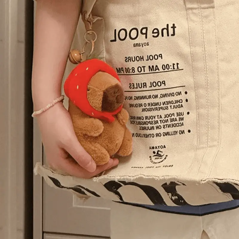 Capybara keychain in use