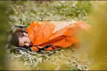 Emergency Camping Thermal Sleeping Bag in use